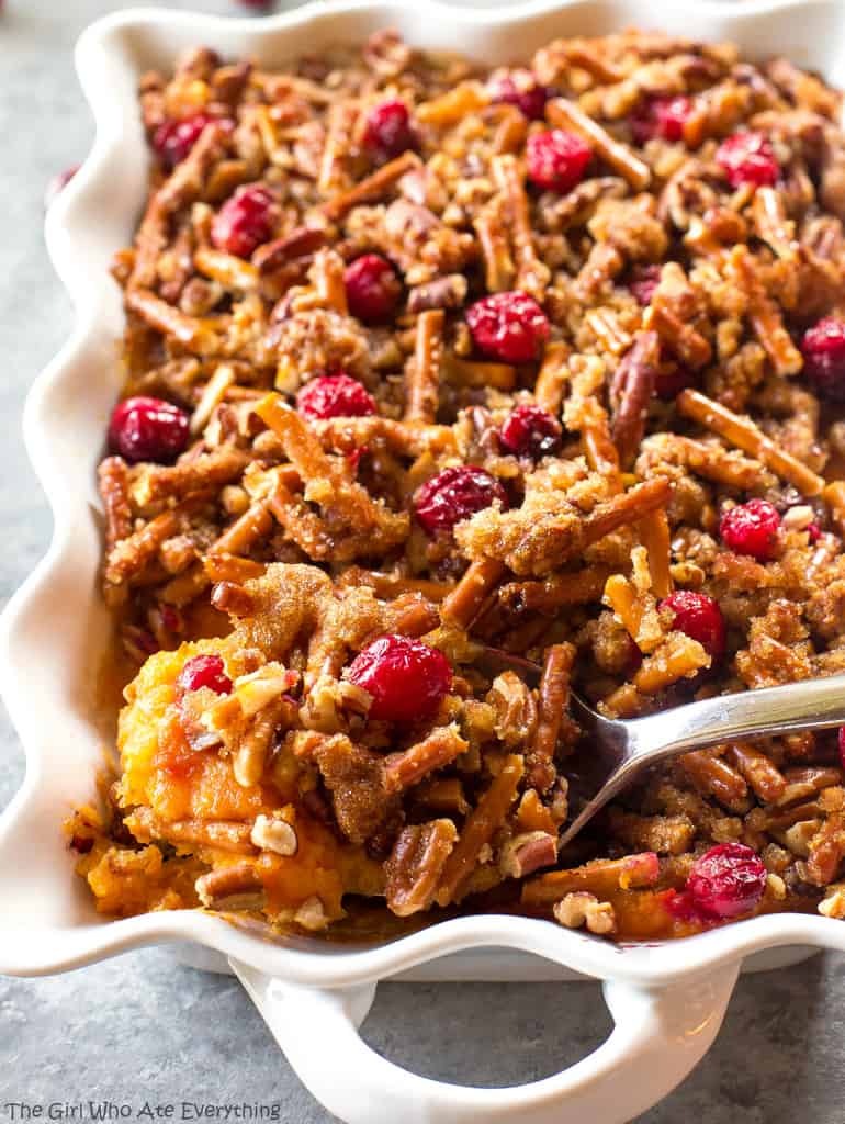Pretzel Cranberry Sweet Potatoes - sweet potatoes topped with a sweet brown sugar pretzel topping and tart cranberries.