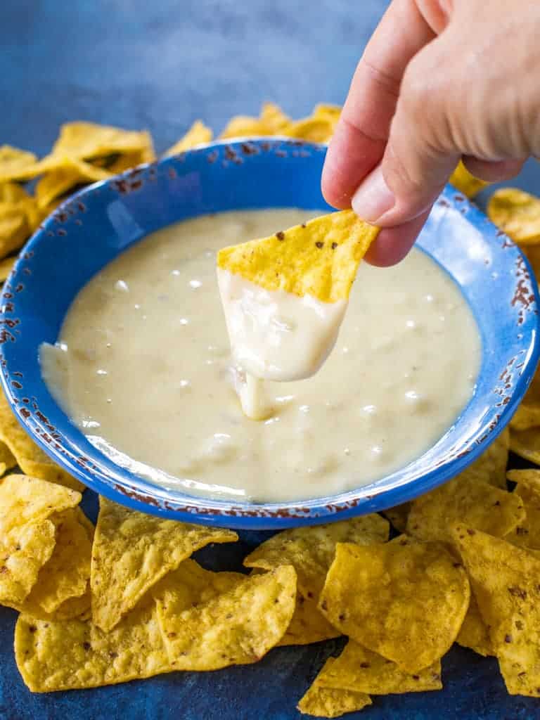 Queso Blanco Dip - only 4 ingredients to creamy, restaurant quality dip appetizer. Can be made in the crockpot too! the-girl-who-ate-everything.com
