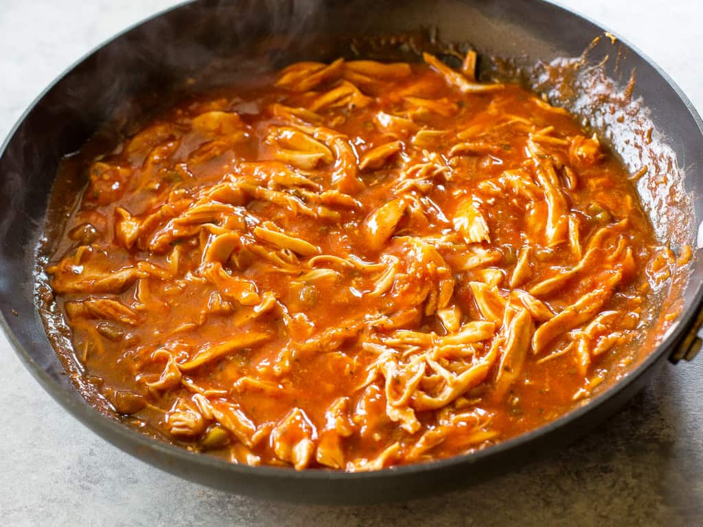 One Pan Chicken Enchilada Skillet enchilada sauce, chicken, and salsa