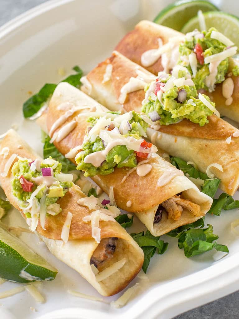 Chicken and Black Bean Flautas on a plate