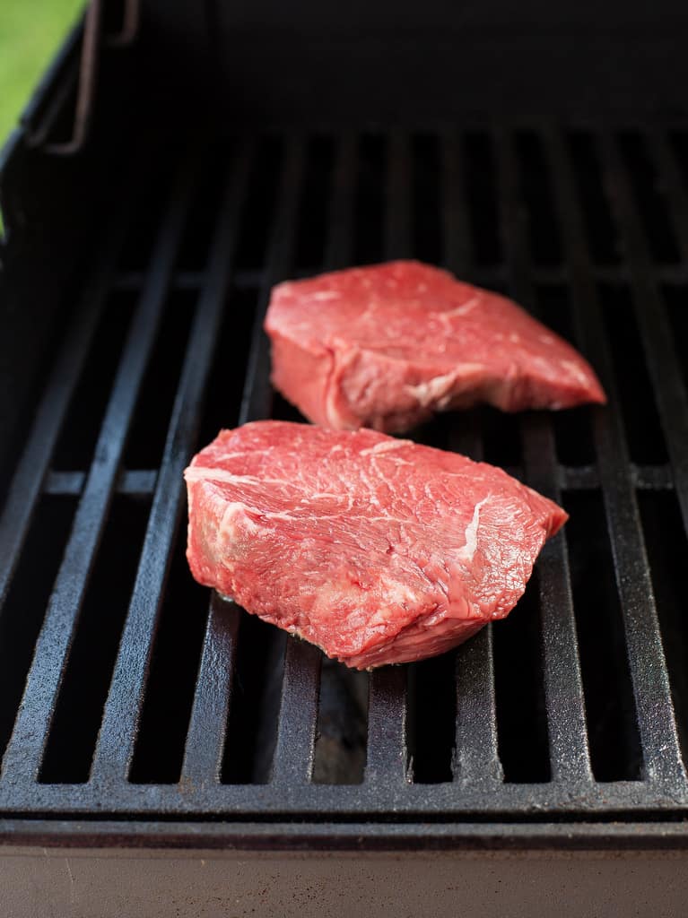 sirloin steak on a grill