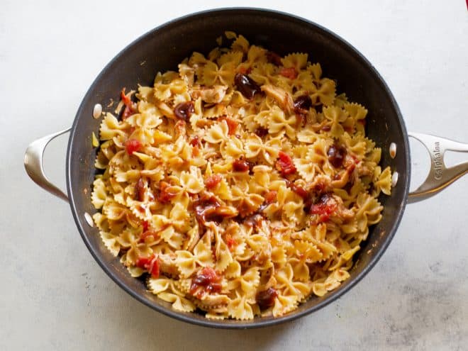tomatoes and pasta in a pan