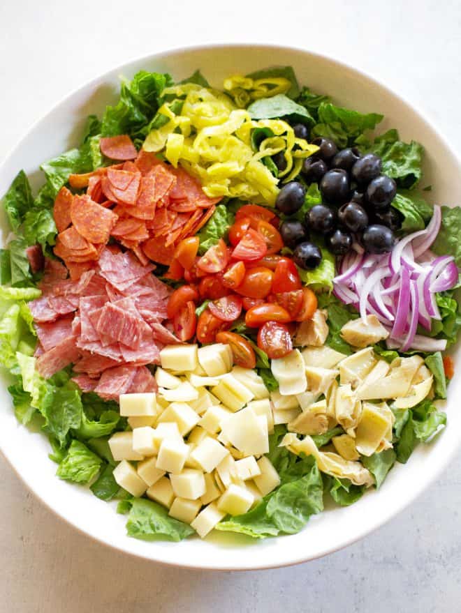 salami, lettuce, provolone, olives, onion, artichokes, tomatoes, and pepperoncini