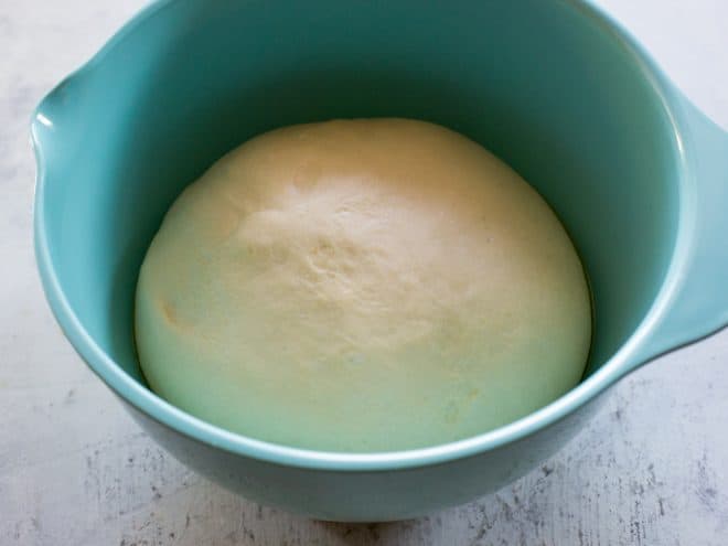 dough rising in a bowl