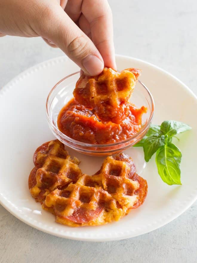 pizza chaffle dipped in marinara