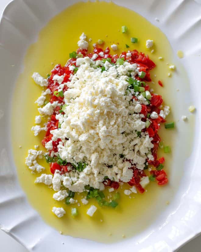 olive oil, tomatoes, green onions, feta