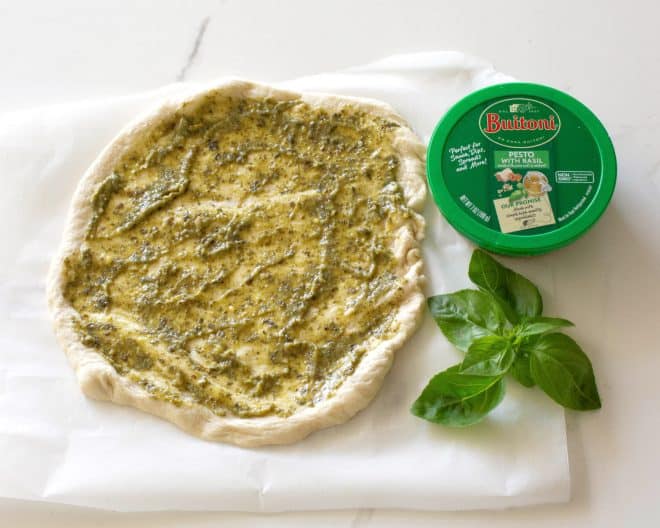 pizza dough with basil pesto