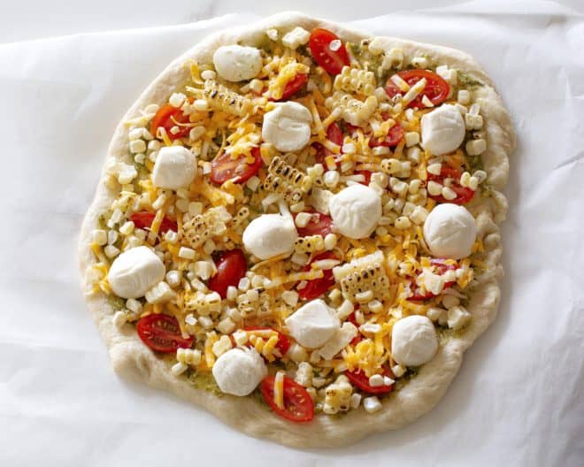 pizza with cheese and tomatoes