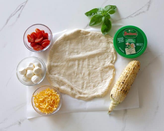 pizza dough with toppings