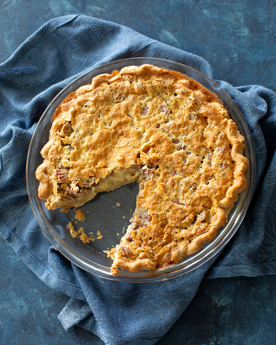 buttermilk pie with a slice cut out