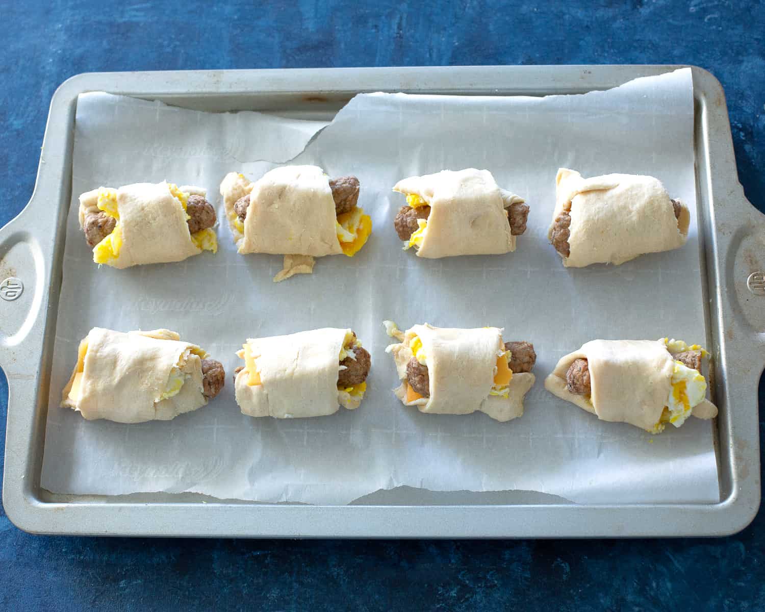 crescent dough wrapped around sausage