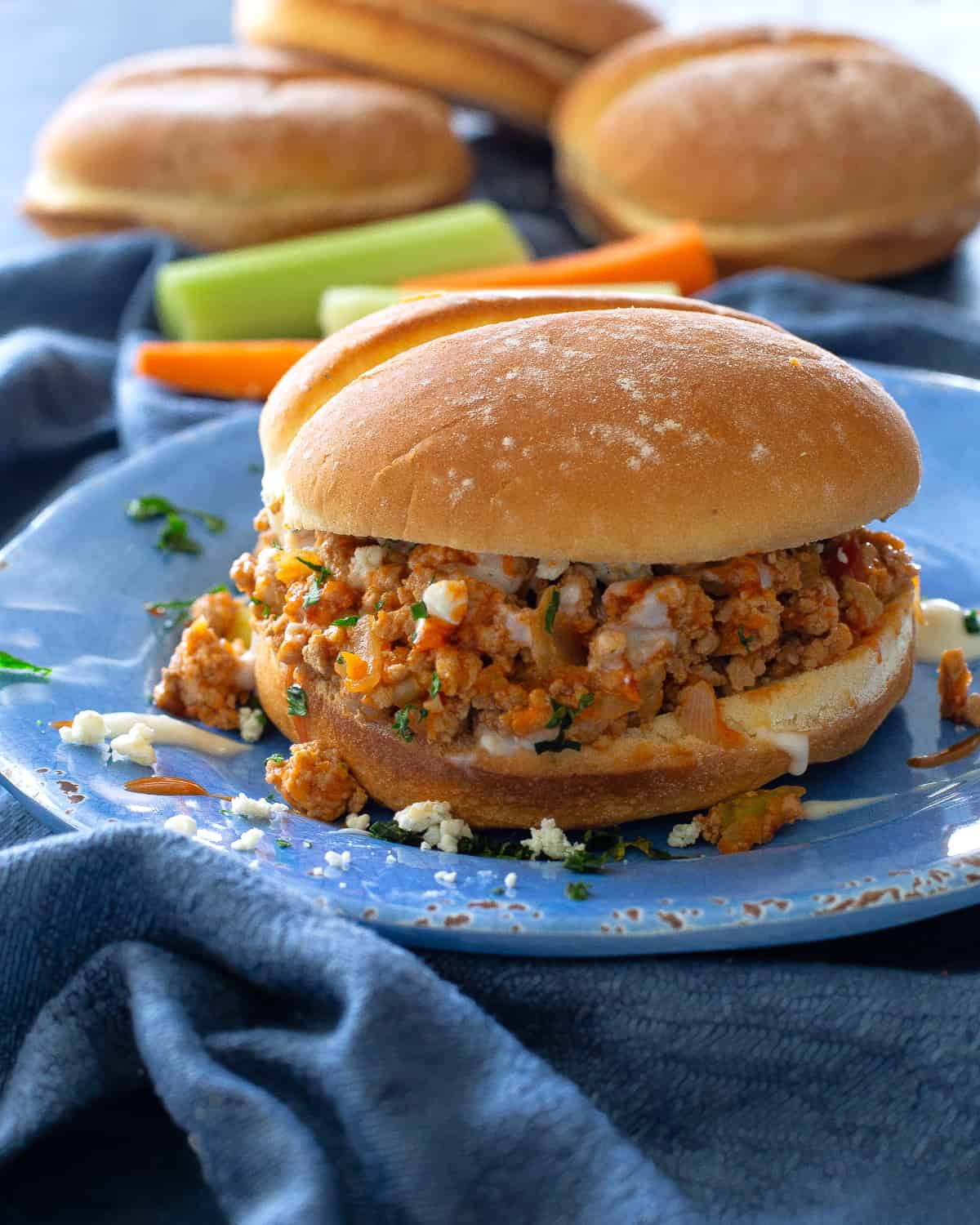 buffalo sloppy joes on a blue plate
