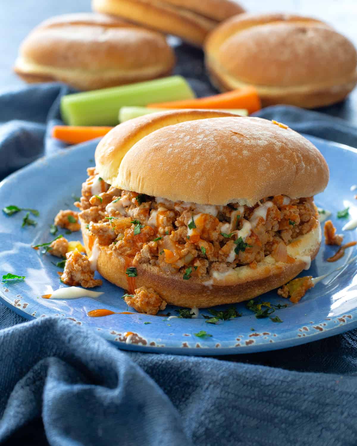 buffalo sloppy joes on a blue plate