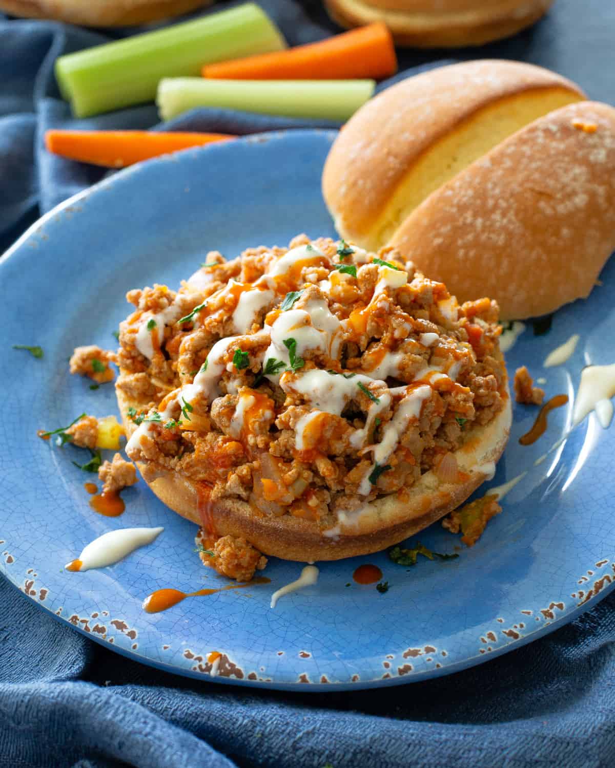 buffalo sloppy joes on a blue plate