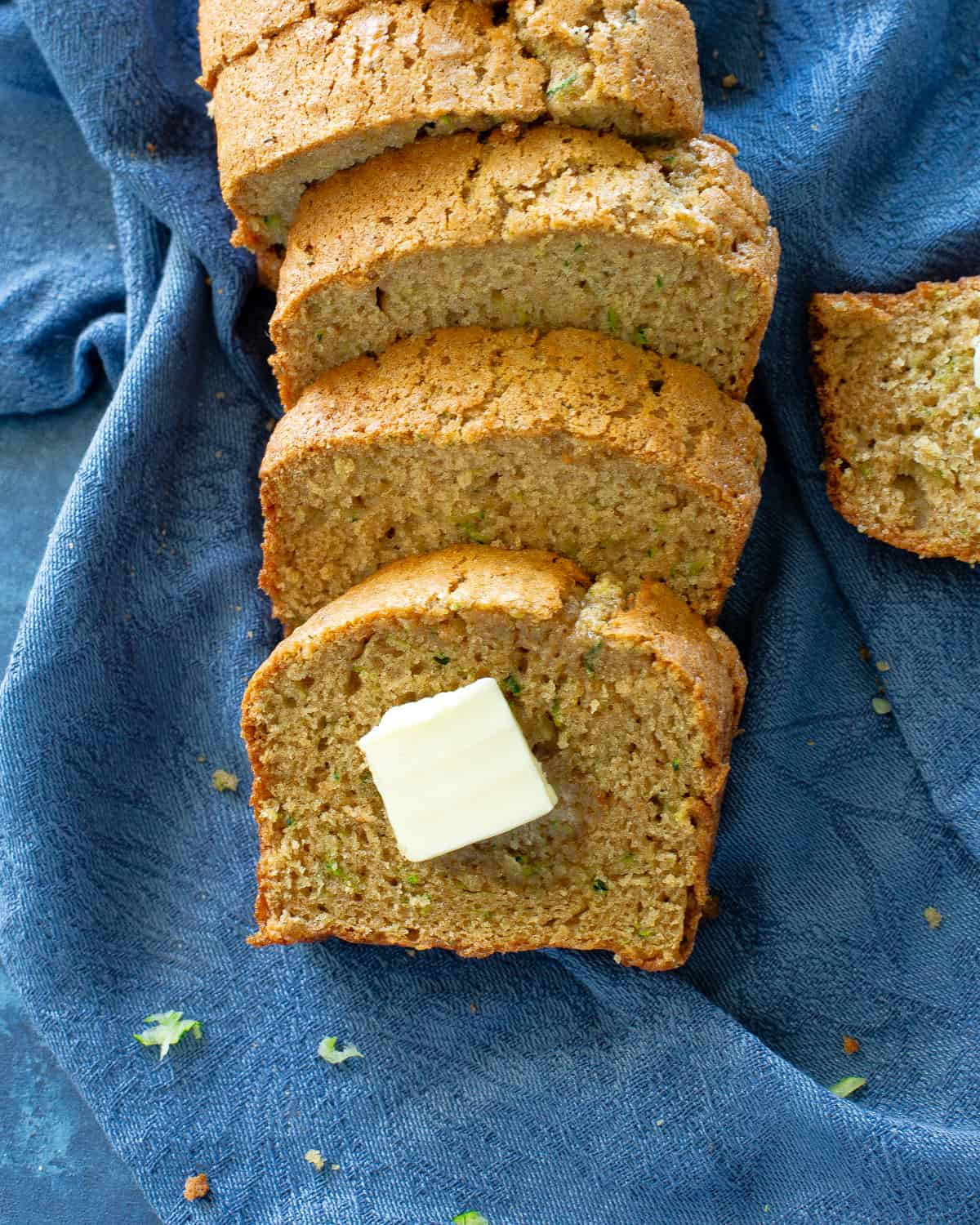 slices of zucchini bread on a blue napkin