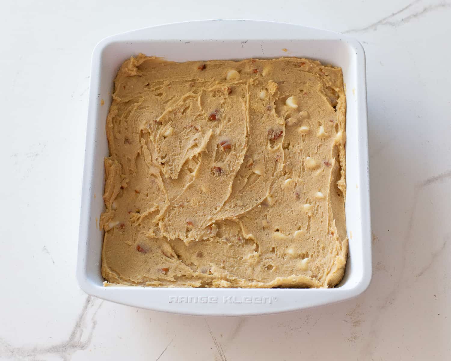 batter in a white pan