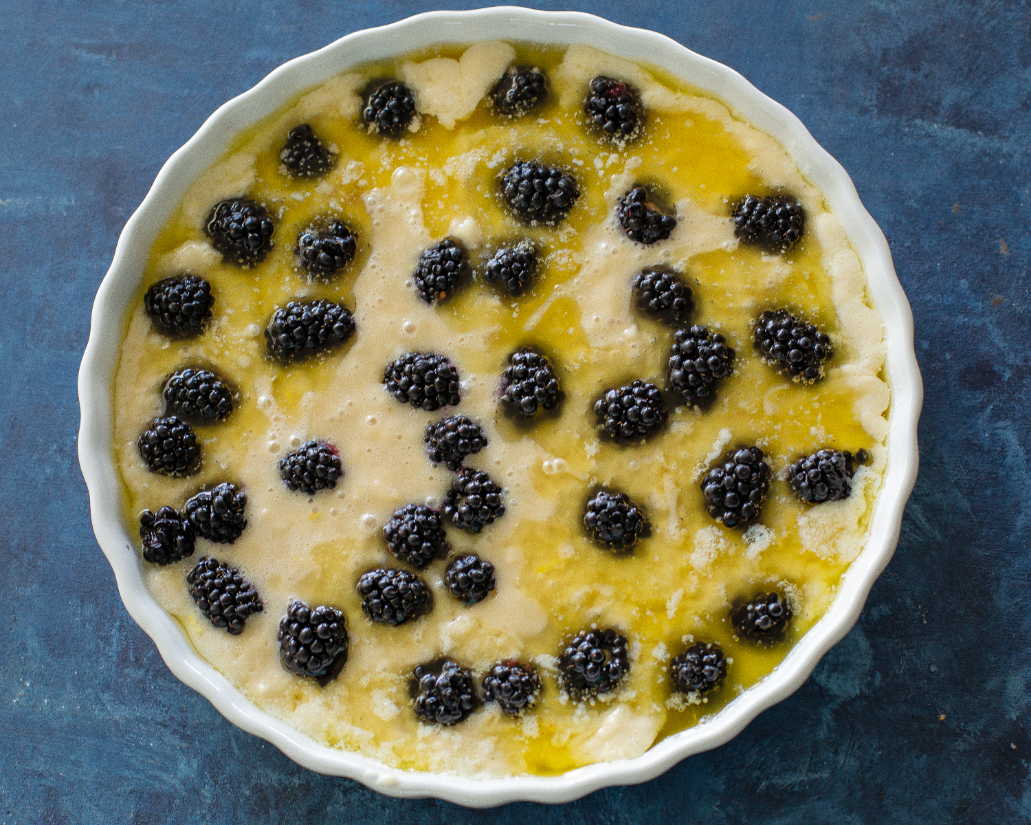 batter with blackberries