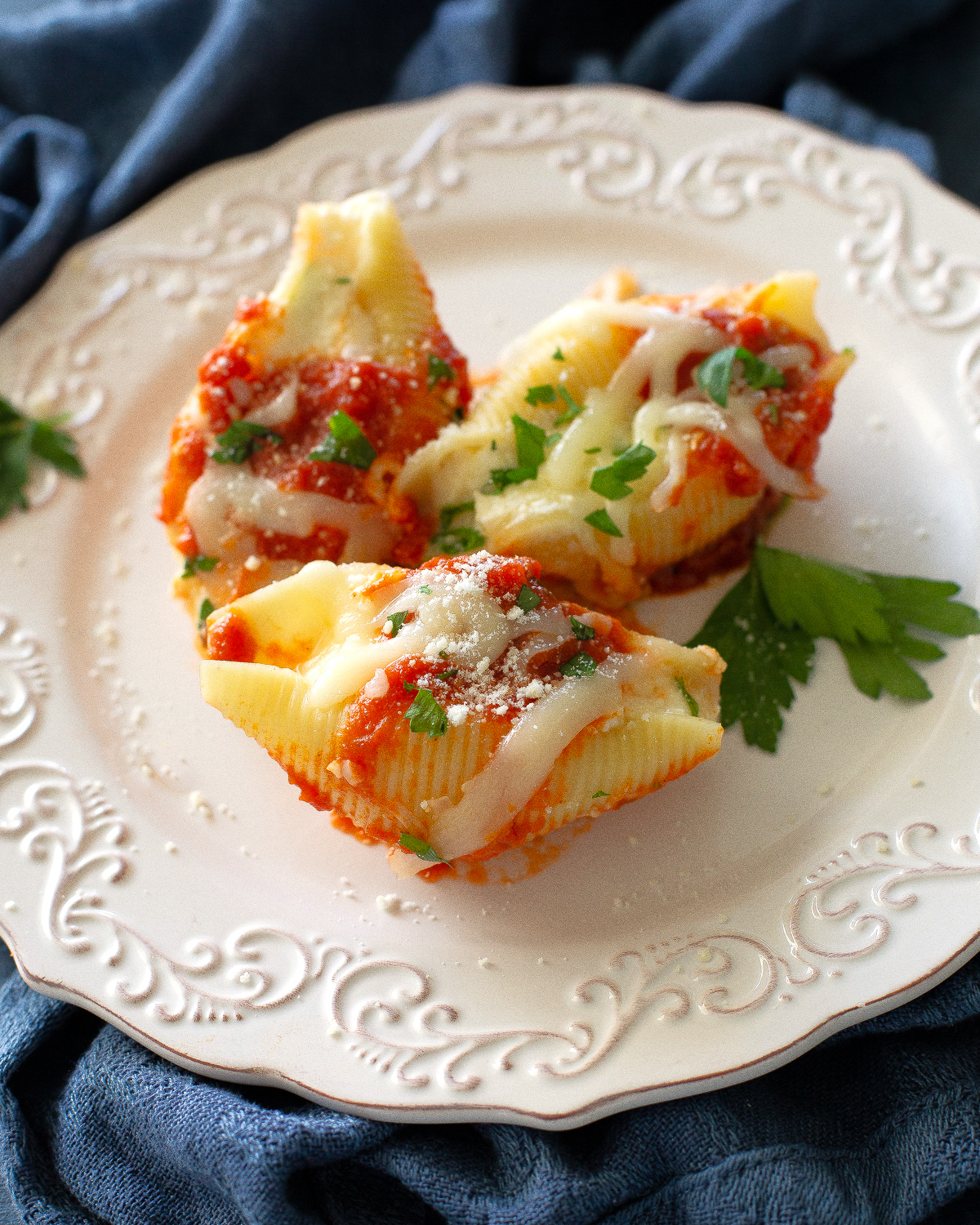 stuffed shells with marinara on top