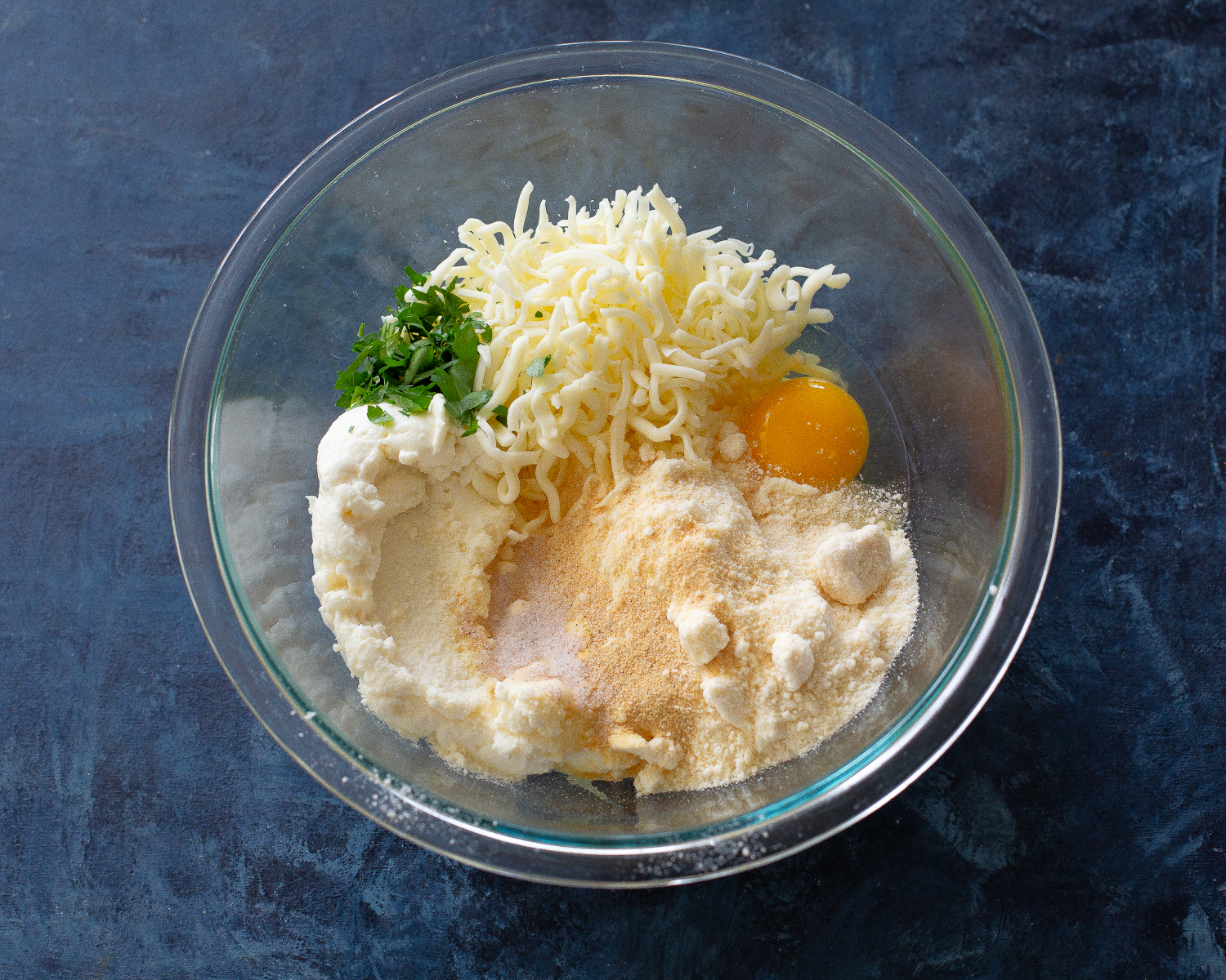 egg and cheese in a bowl
