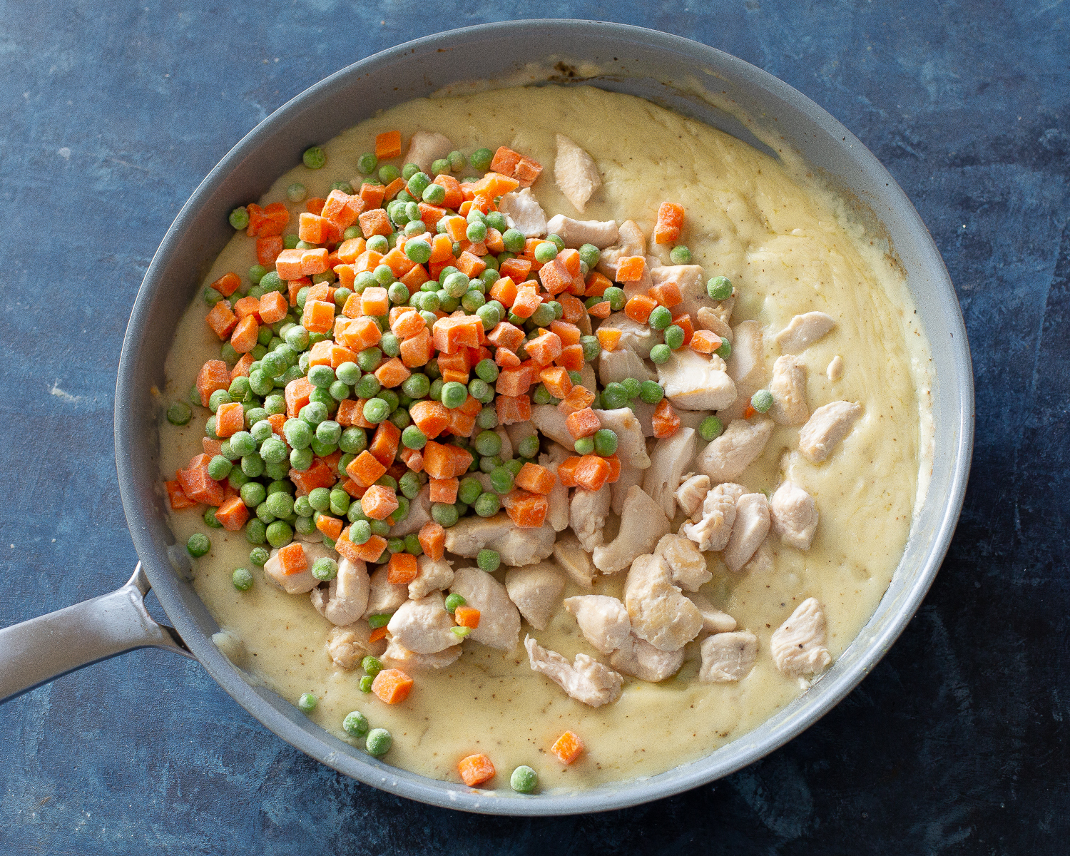 carrots and peas in sauce