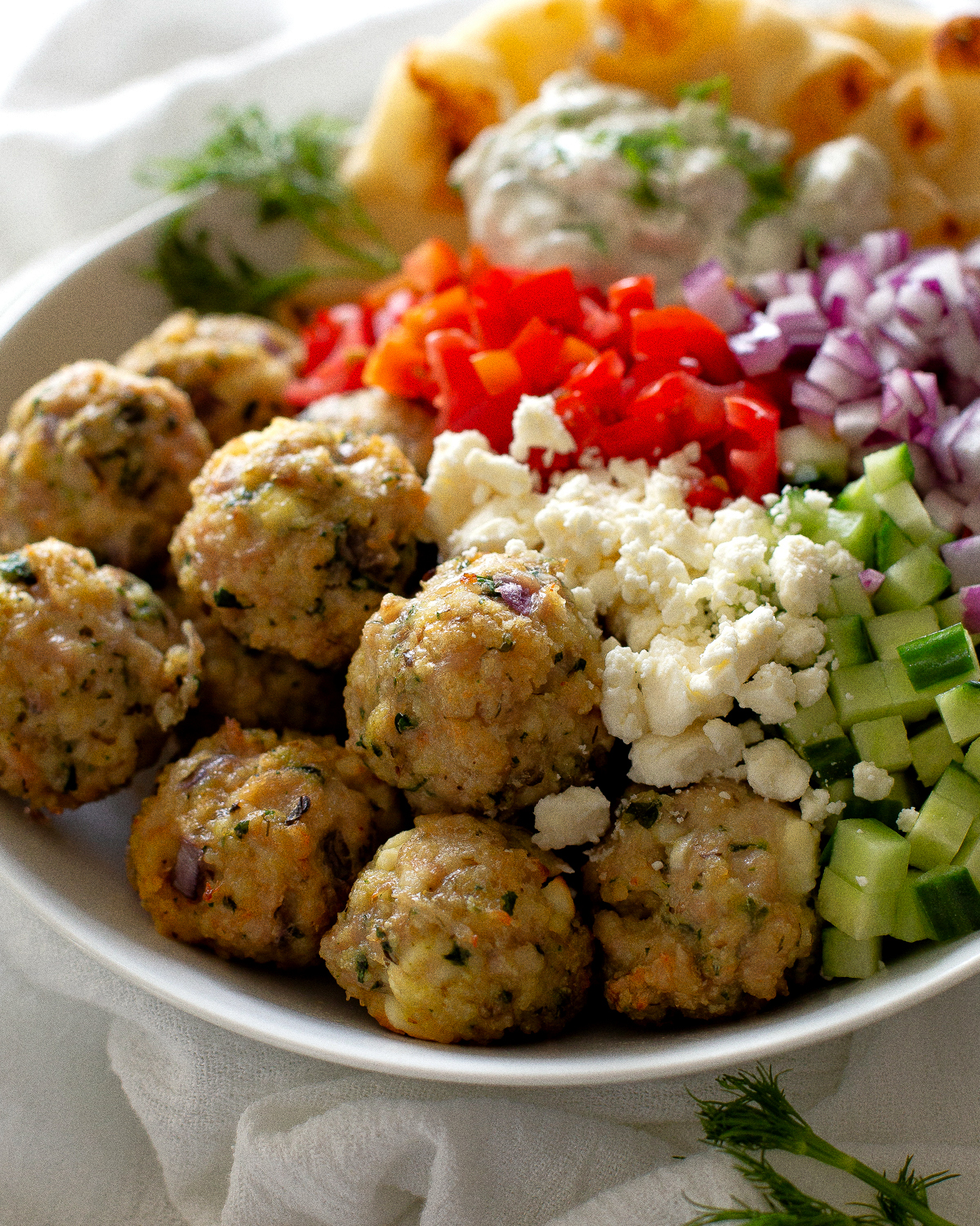greek meatballs with feta tomato and cucumber