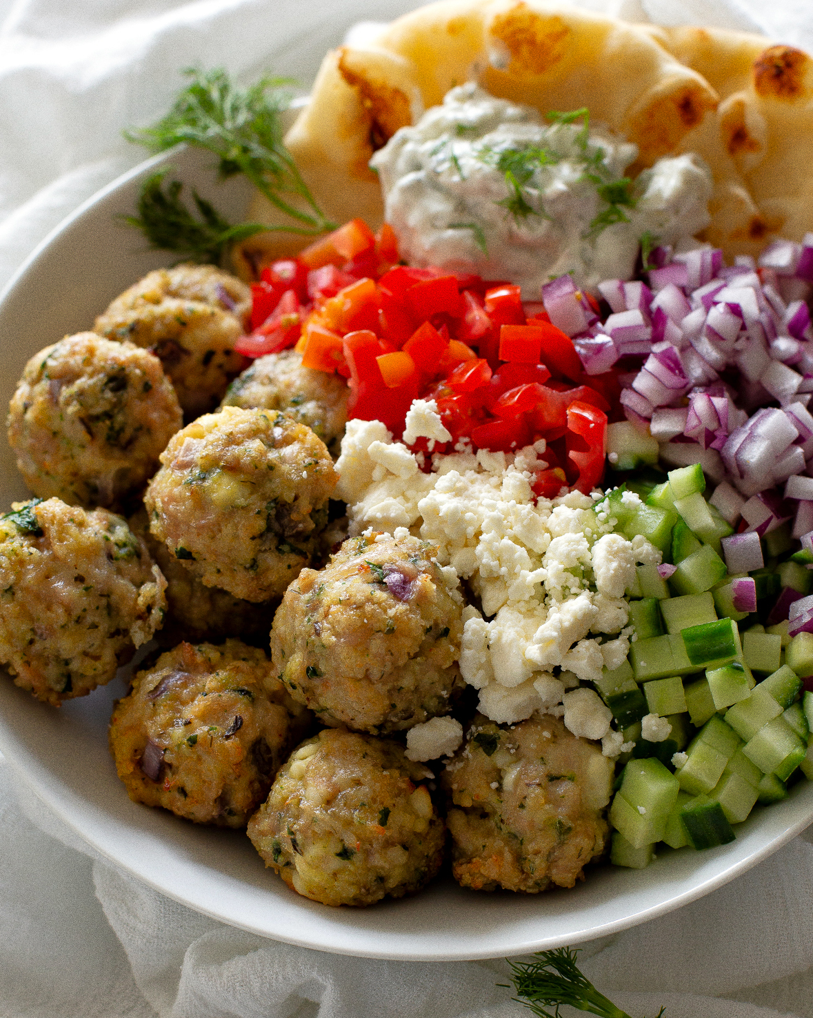 greek meatballs with feta tomato and cucumber