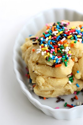 Cake Batter Truffles - cake batter flavored edible dough dipped in vanilla coating and lots and lots of sprinkles. the-girl-who-ate-everything.com